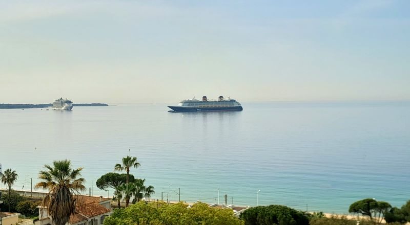 Cruise ship by the coastline of Cannes, France.