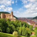 Heidelberg in Germany on a sunny day with blue sky and white clouds.