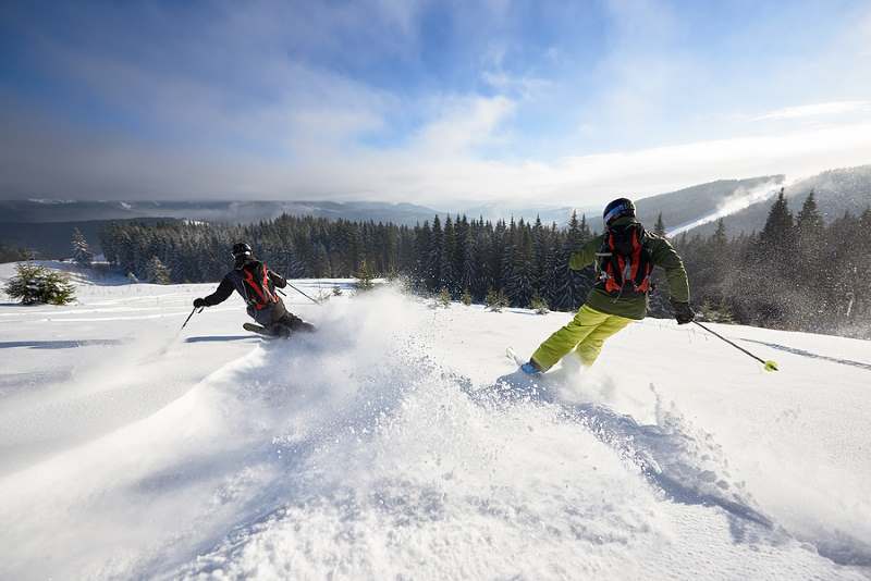 Skiing on a clear sunny day.