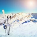 Standing skiis on a sunny day in the Alps.