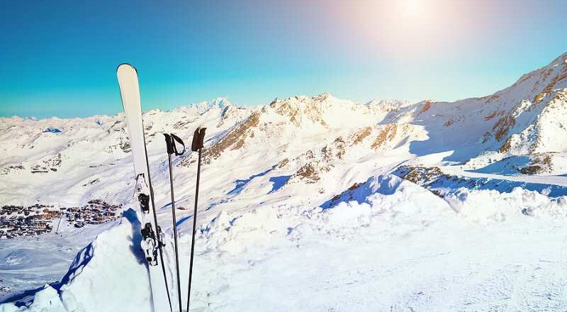 Standing skiis on a sunny day in the Alps.